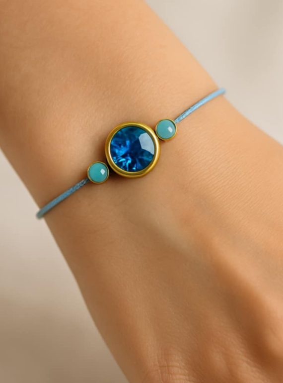 ✨ UShine.gr: Βραχιόλι κορδόνι με γαλάζιο κρύσταλλο & ατσάλι σε χρυσό No 137