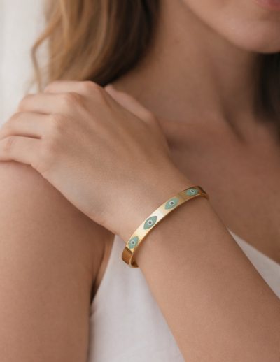 ✨ UShine.gr: Ατσάλινη χειροπέδα σε χρυσό τόνο με μοτίβο ματάκι No 1503