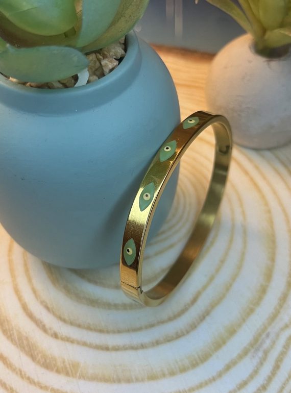 ✨ UShine.gr: Ατσάλινη χειροπέδα σε χρυσό τόνο με μοτίβο ματάκι No 1503