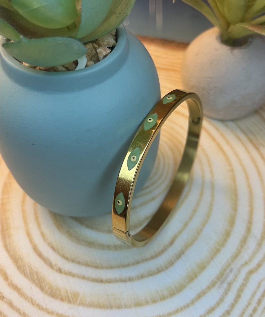 ✨ UShine.gr: Ατσάλινη χειροπέδα σε χρυσό τόνο με μοτίβο ματάκι No 1503