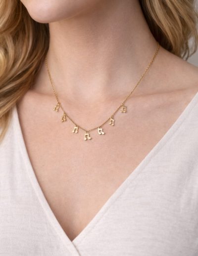 ✨ UShine.gr: Ατσάλινο κολιέ με μουσικές νότες σε χρυσό τόνο No 1484